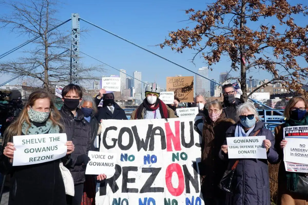 Bridge protests tie neighborhood and skyline together.